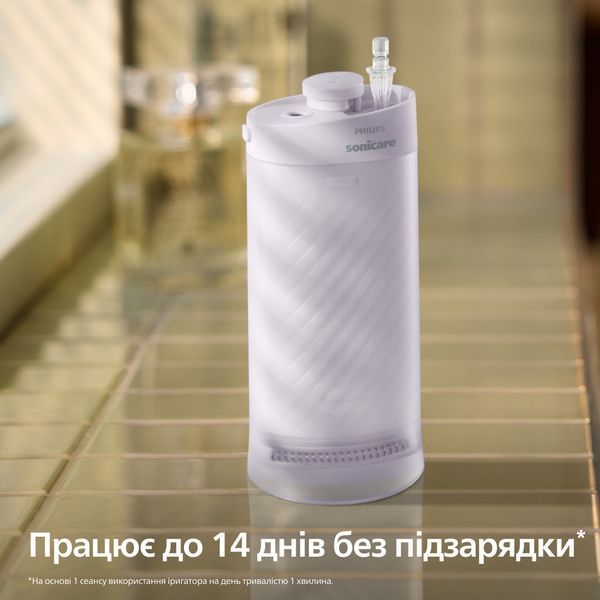 Іригатор Philips Sonicare Compact Flosser 1000 Purple HX3333/23 619840ua фото