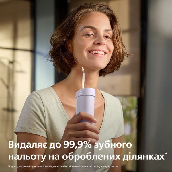 Іригатор Philips Sonicare Compact Flosser 1000 Purple HX3333/23 619840ua фото