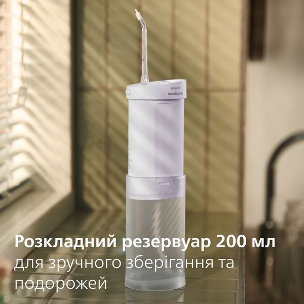 Іригатор Philips Sonicare Compact Flosser 1000 Purple HX3333/23 619840ua фото